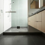 modern glass shower door in bathroom